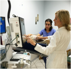 Dr. Jamie Peisel doing ultrasound at Marina Hills Animal Hospital